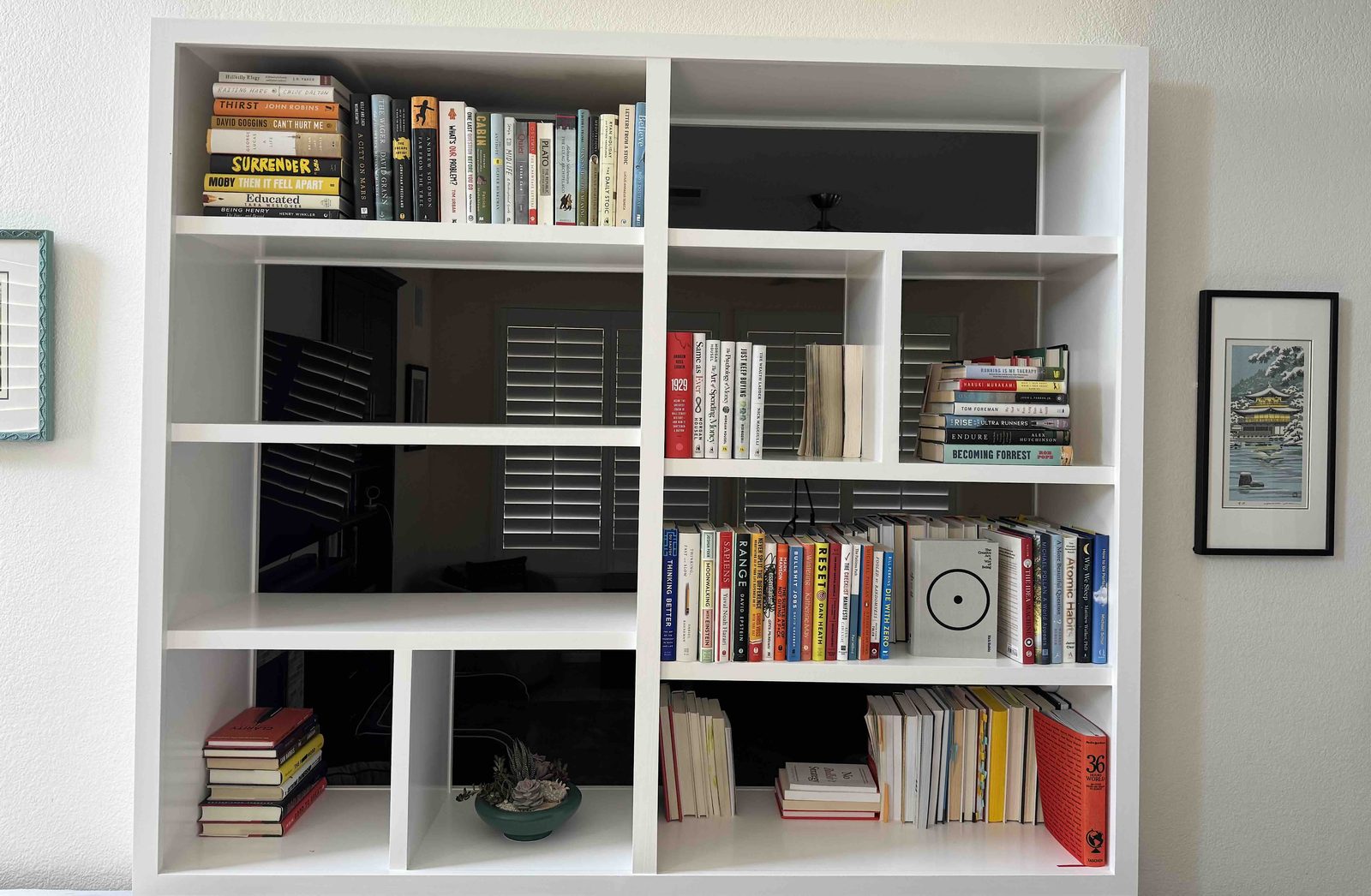 Matthew's bookshelf, full of the books tracked on this site